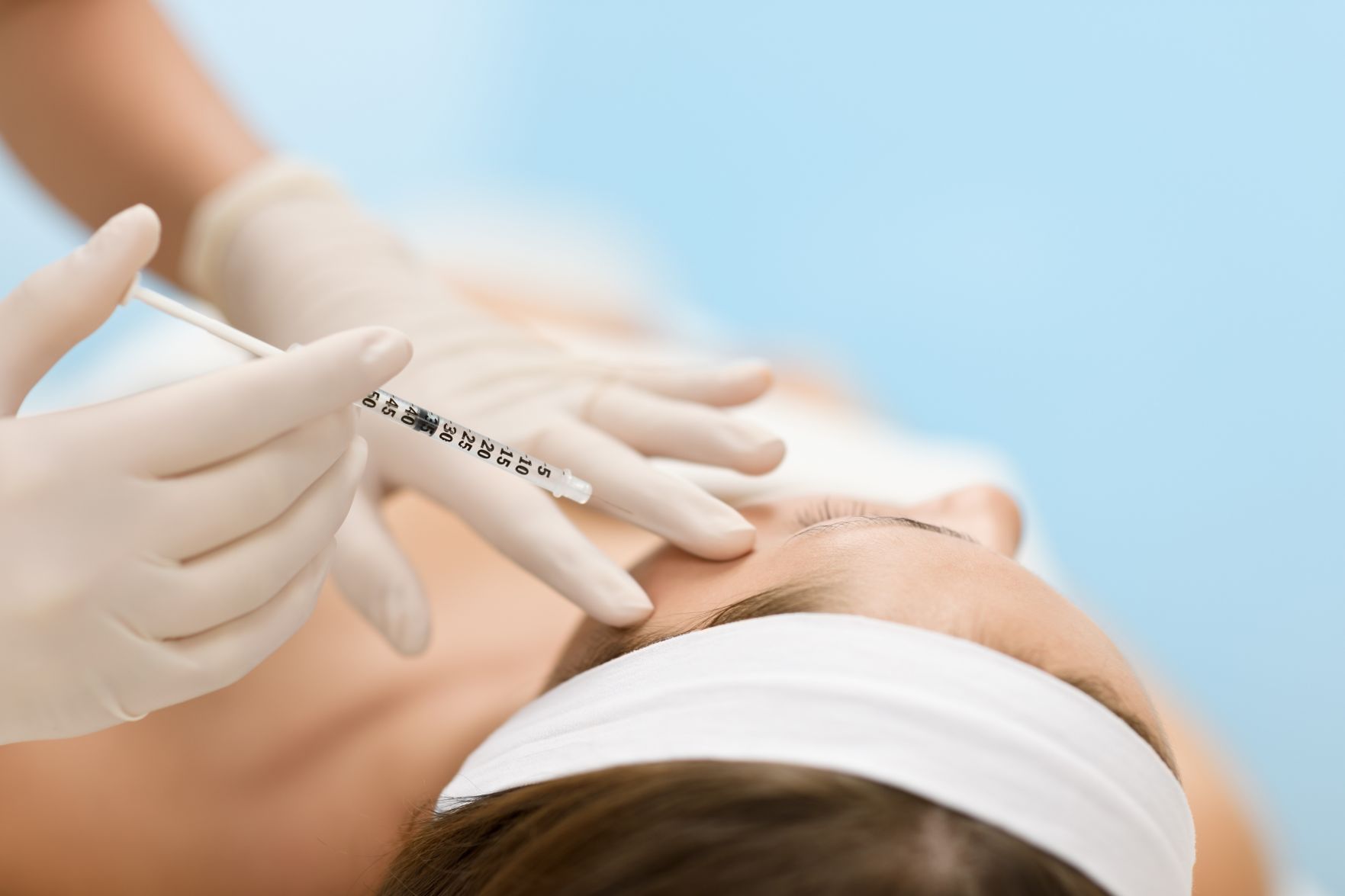 Botox injection - Woman in cosmetic medicine treatment